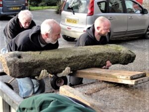 Fig 7 Ian & Alex Piper with Peter Hooper removing the Fursnewth Cross