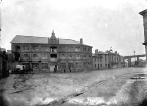 Hayle Foundry Square.
The flooding shown happened C1900
The biscuit works is in this photo, and the White Hart is to the left just out of shot. This view hasn’t really altered much in the intervening years.