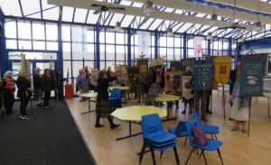 Banner Bearers being sorted by Priscilla Oates Federation Banner Marshall